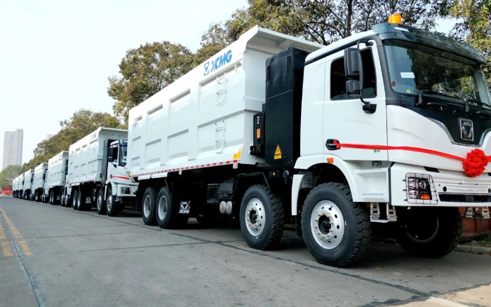 凯发k8一触即发纯电动自卸车列队出海，助力当地煤炭运输绿色转型